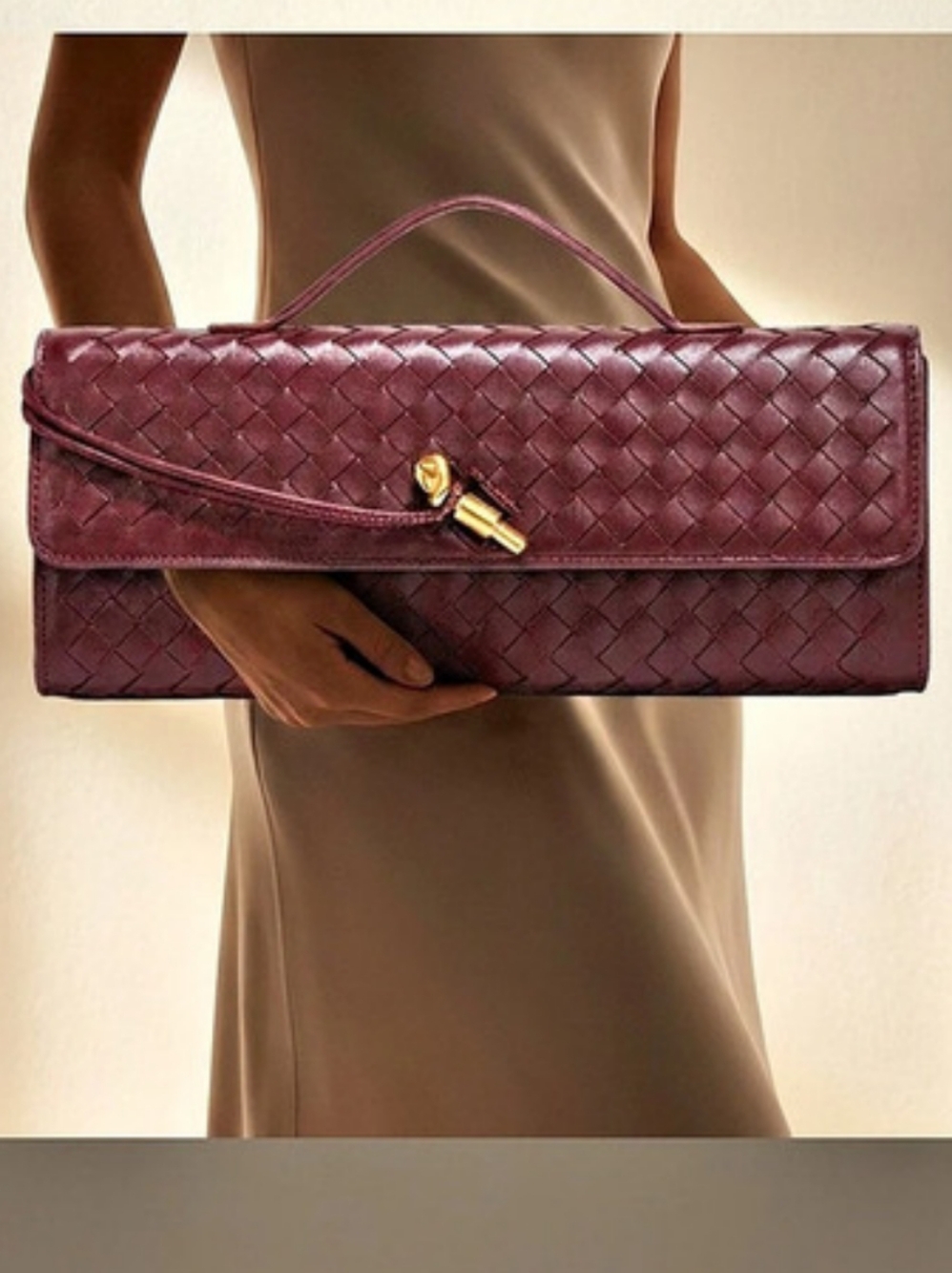 Elegant woven leather clutch in deep burgundy
